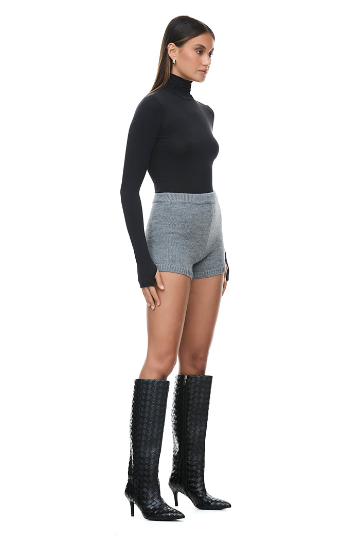 THE TULSA BLACK TURTLENECK TOP | model